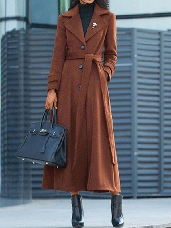 Stylish Elora women's long wool coat, an elegant outerwear piece with a distinctive shawl collar.