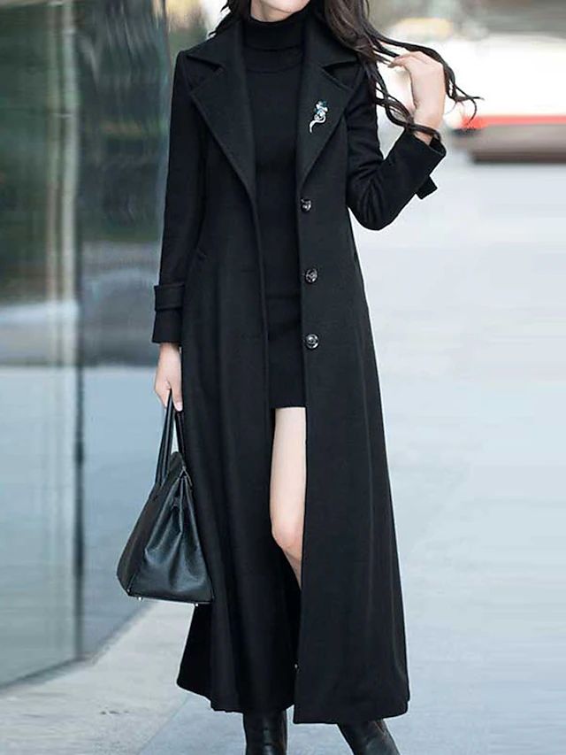 Luxury women's wool coat with a chic shawl collar, offering both warmth and elegant winter style.