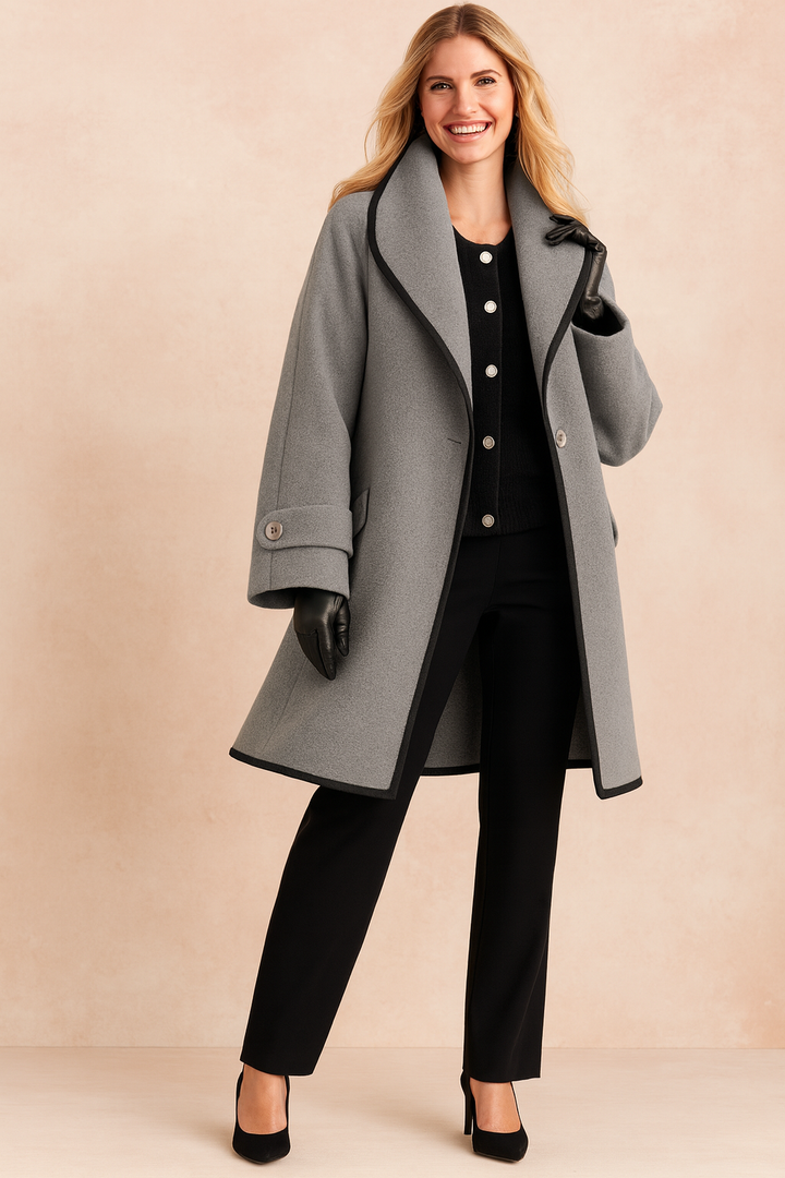 Warm & stylish women's winter jacket, a cozy long coat with elegant contrasting trim for daily wear.
