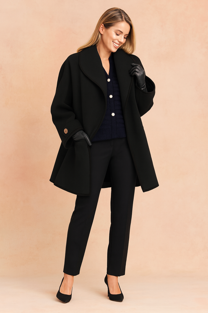 Stylish women's winter jacket with elegant contrasting trim, a sophisticated long coat for women's fashion.