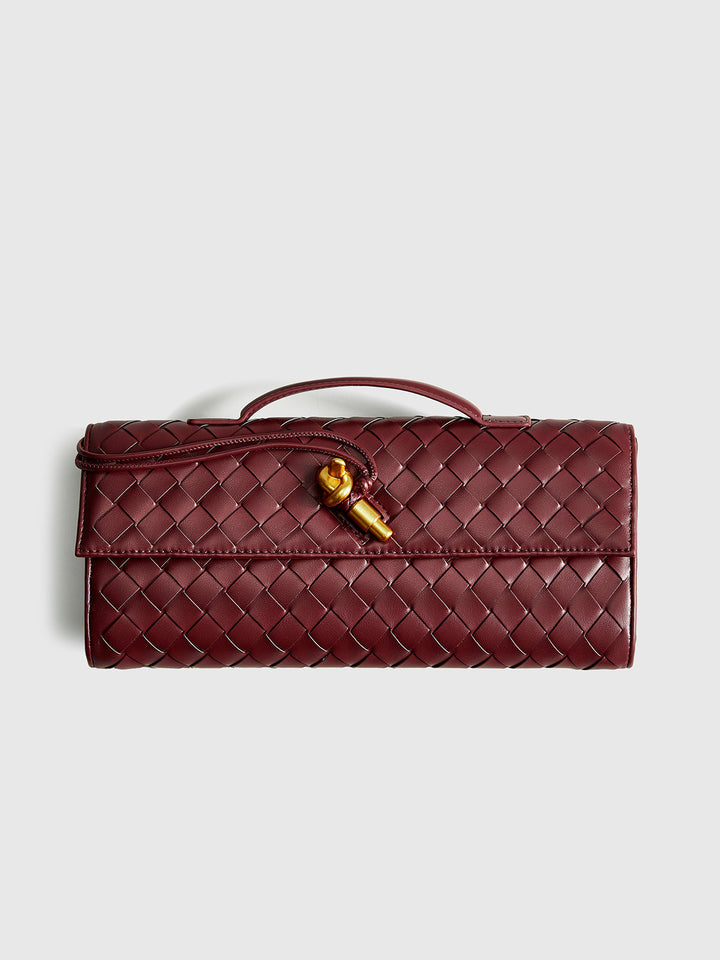 Chic woven texture clutch with secure flap closure, a stylish women's evening purse.