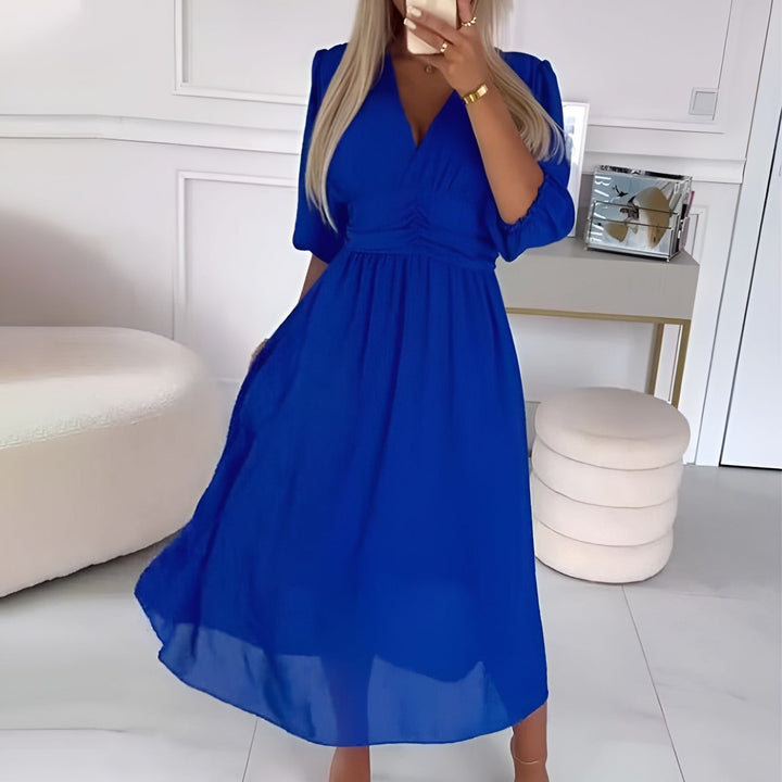 Beautiful green women's wrap midi dress with adjustable fit, flattering for various body types. Elegant and versatile.