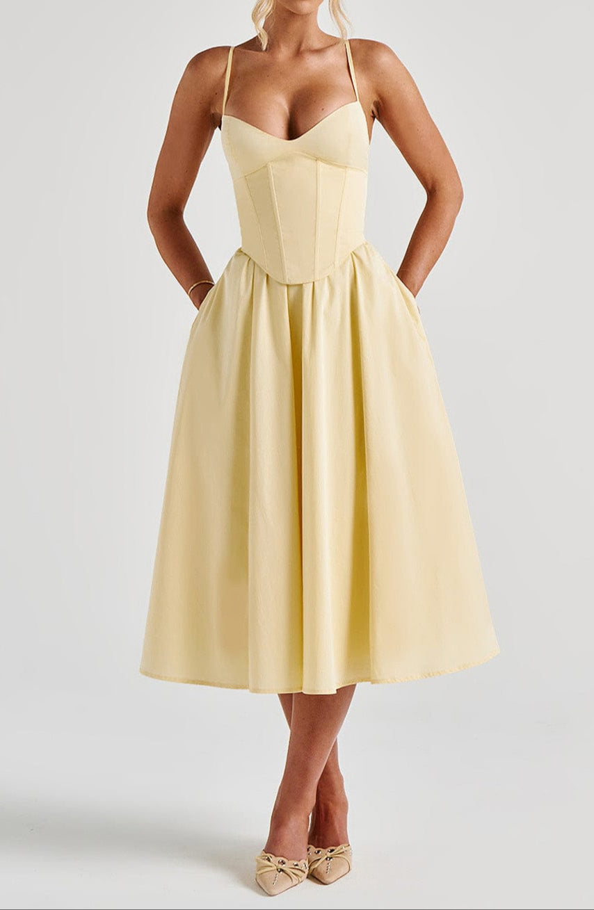 Luxurious yellow corset midi dress. Elegant A-line cut, spaghetti straps, ideal women's formal gown for weddings & cocktails.