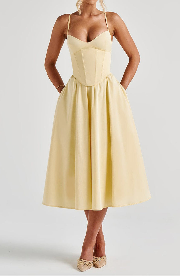 Luxurious yellow corset midi dress. Elegant A-line cut, spaghetti straps, ideal women's formal gown for weddings & cocktails.