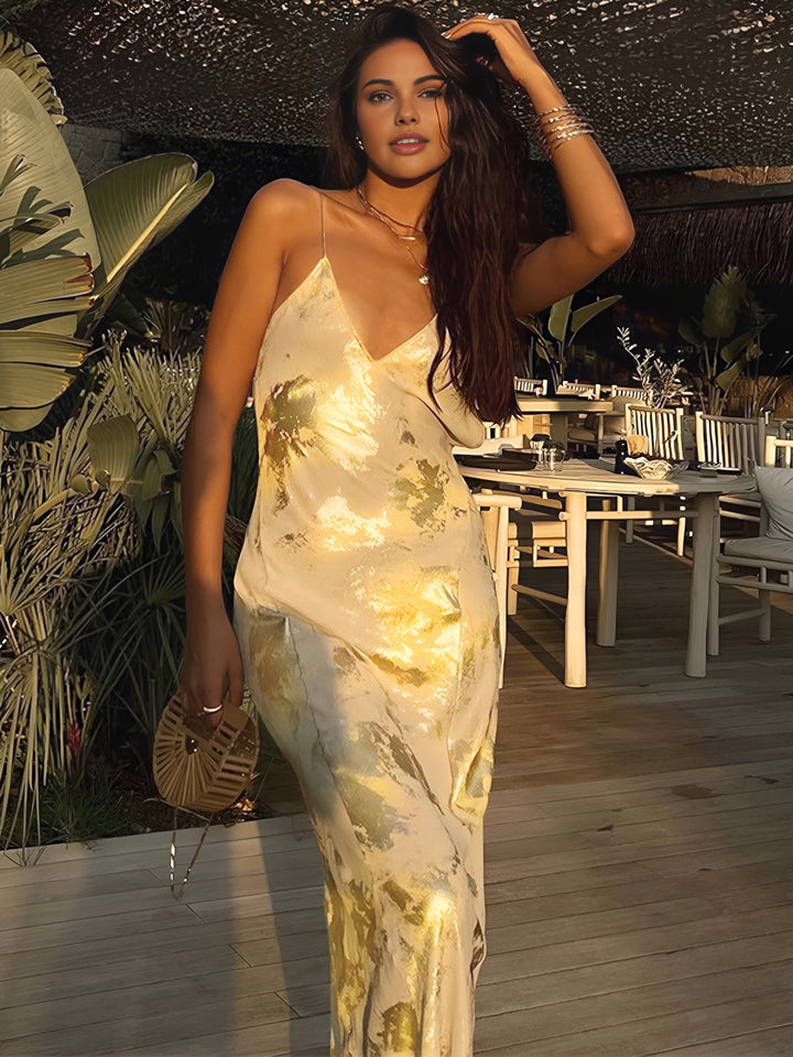 Lightweight yellow floral maxi dress, perfect for summer. Elegant design, comfortable women's party wear.