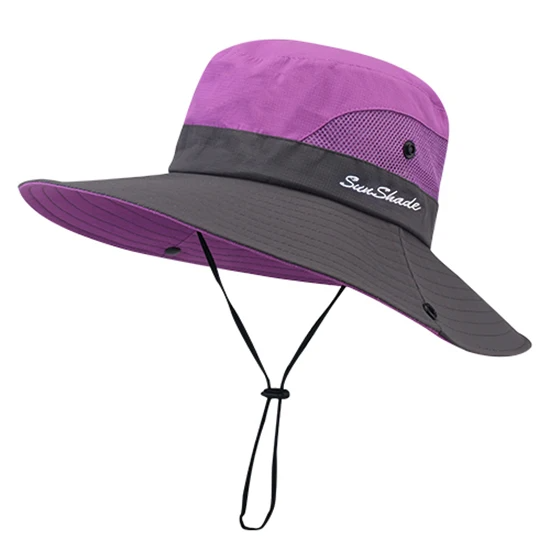 Neutral-colored women's sun hat, wide brim for effective UV protection & summer style.