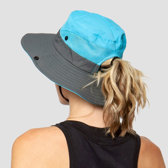 Fashionable women's beach hat with UV protection, perfect for summer vacations & outdoor style.
