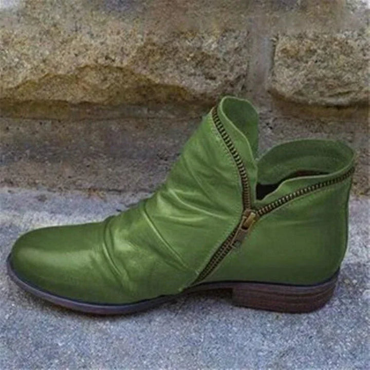 Fashionable women's ankle boots. Orthopedic support, ruffle detail, and practical side-zip for winter.
