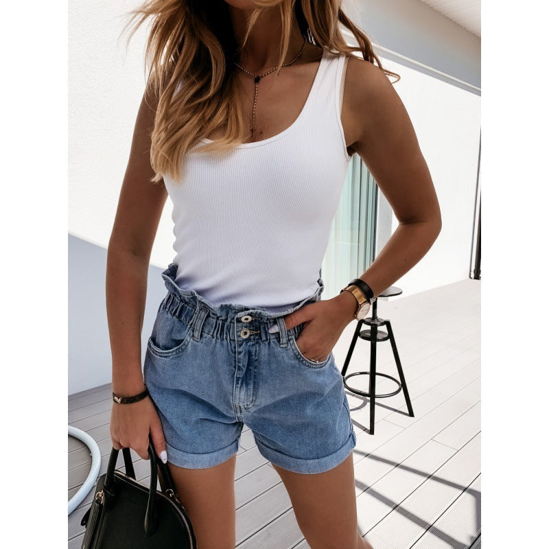 Chic women's high-waisted denim shorts, featuring a relaxed fit & roll-cuff. Ideal for everyday summer fashion.