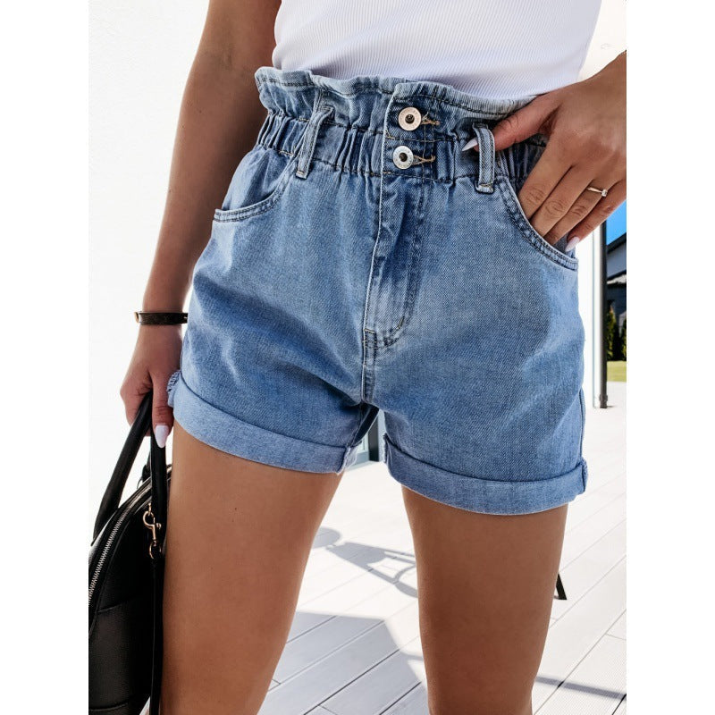 Stylish light blue high-waisted denim shorts for women, with paperbag waist & utility pockets. Casual summer chic.
