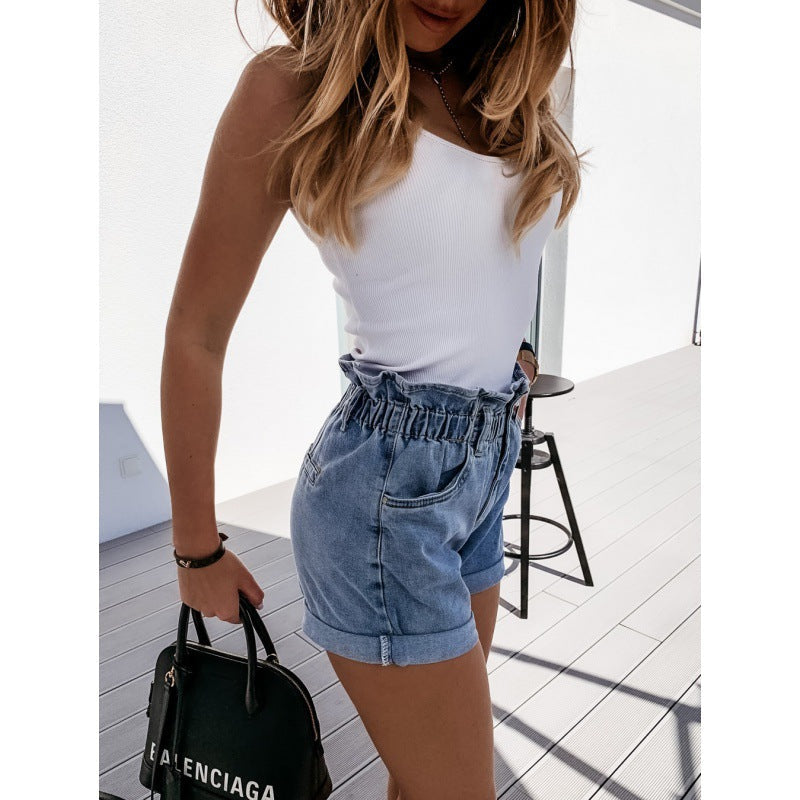 Comfortable women's light blue high-waisted denim shorts with roll-cuff, great for relaxed everyday summer outfits.
