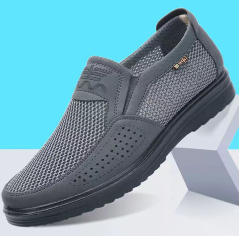 Grey men's casual slip-on orthopedic shoes with breathable mesh. Ideal for comfortable everyday walking.
