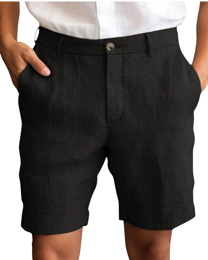 Men's stylish tailored linen shorts for warm weather, perfect for smart casual summer outfits.