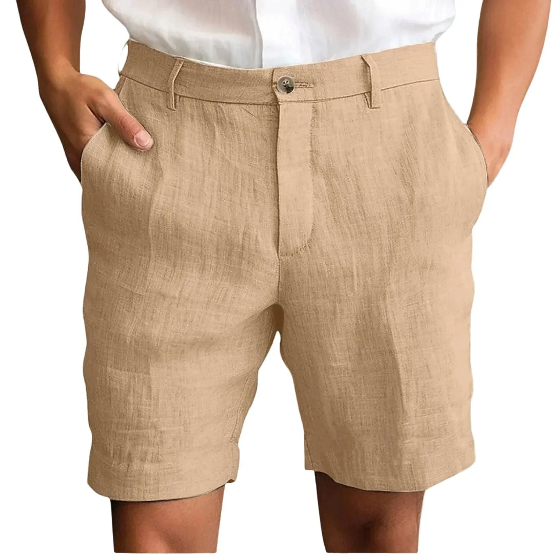 Men's tailored linen shorts paired with a polo, demonstrating smart casual summer wear.