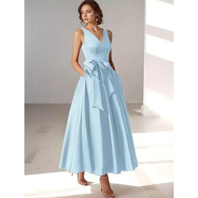 Elegant women's pleated V-neck midi dress, perfect for race days & summer occasions.