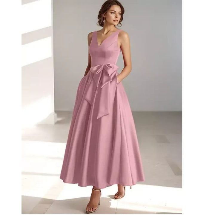 Classic elegant women's pleated V-neck midi dress, suitable for race day glamour.
