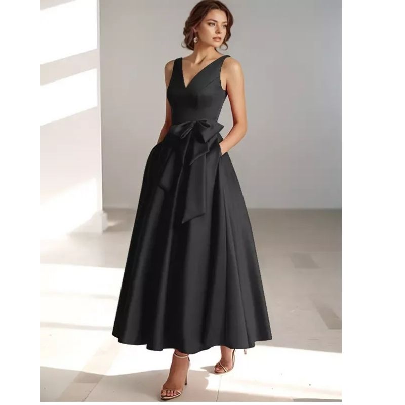 Stunning pleated A-line V-neck midi dress, perfect for elegant spring/summer race days.
