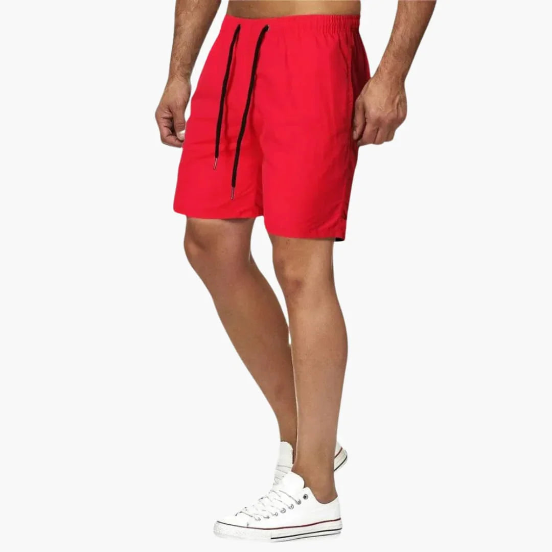 Stylish men's resortwear swim shorts with drawstring. Perfect quick-dry beachwear & poolside comfort.