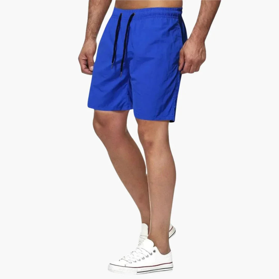 Comfortable men's quick-dry swim shorts featuring a secure drawstring closure. Great for summer activities.