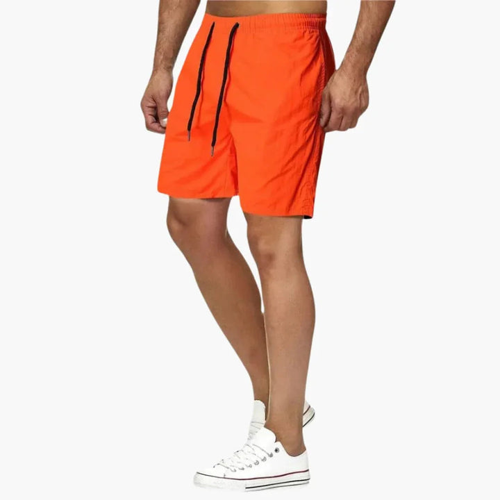 Men's active quick-dry swim shorts with a comfortable drawstring waist. Perfect for beach sports & swimming.