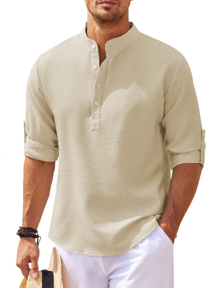 Man wearing a trendy long sleeve urban style casual shirt, showcasing modern men's fashion and comfort.