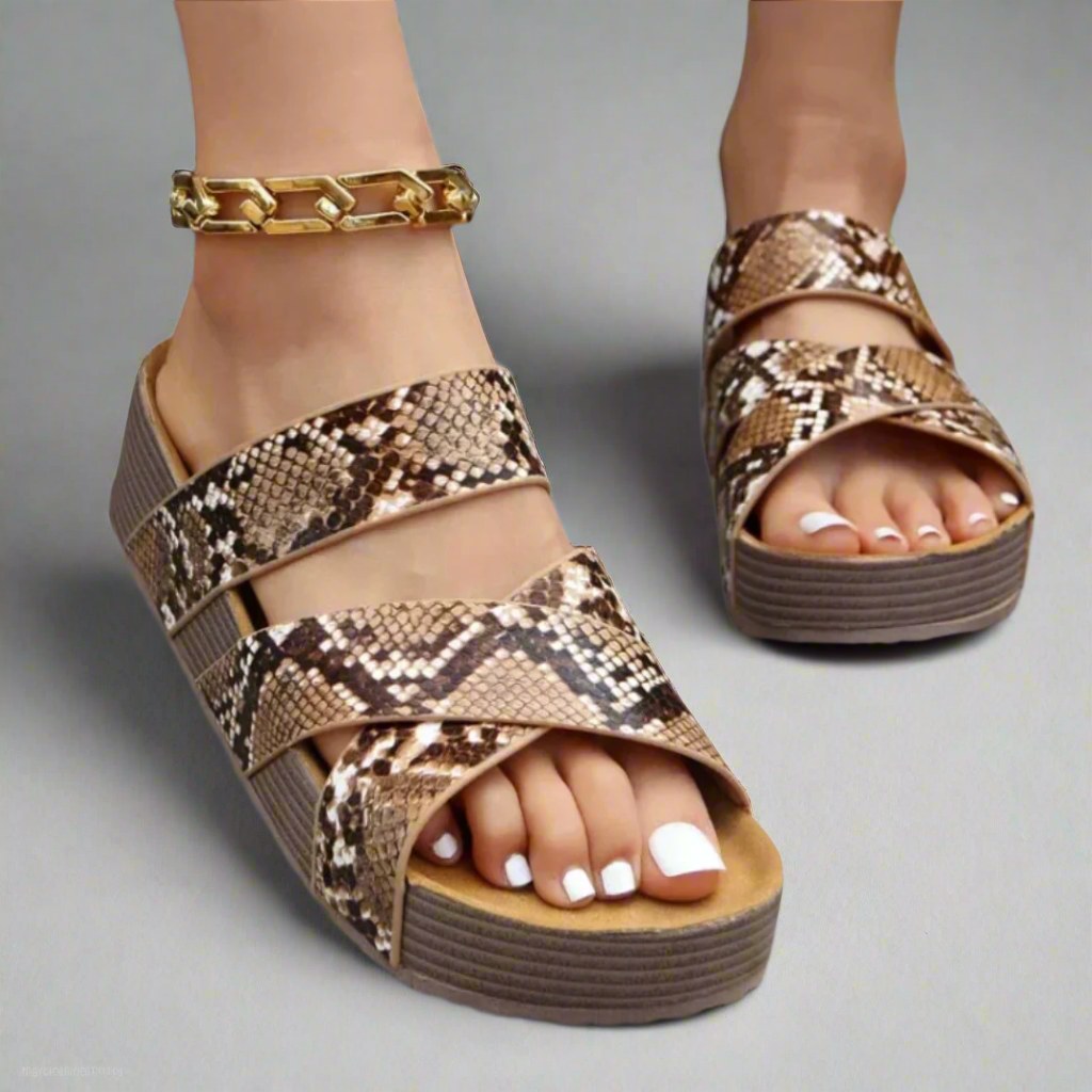Women's casual orthopedic sandals with cushioned footbed and arch support, perfect for comfortable summer walking.