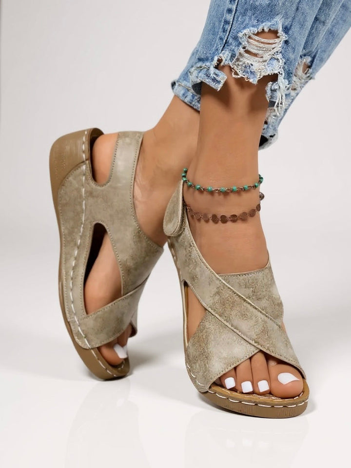 Comfortable women's boho wedge sandals with stylish cross straps, perfect for casual wear.