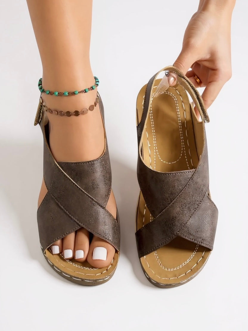 Boho-chic women's sandals: comfortable platform wedge design with stylish cross straps.
