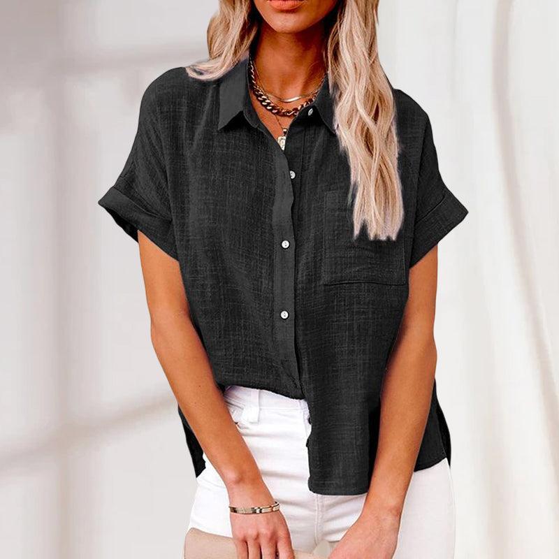 Versatile women's textured button-up shirt. Relaxed fit for effortless style, suitable for any casual occasion.