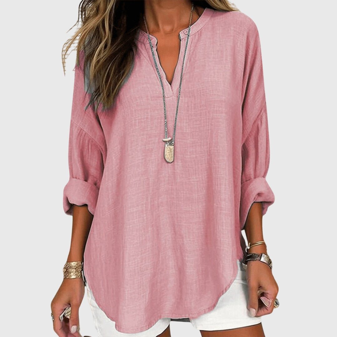 Casual women's long sleeve tunic with a V-neck, great for beach wear or relaxed everyday fashion.