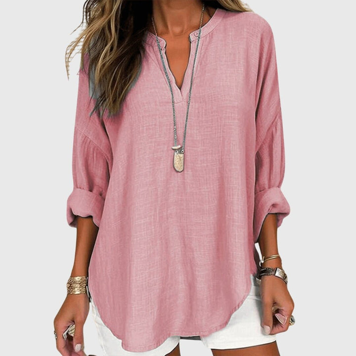 Casual women's long sleeve tunic with a V-neck, great for beach wear or relaxed everyday fashion.