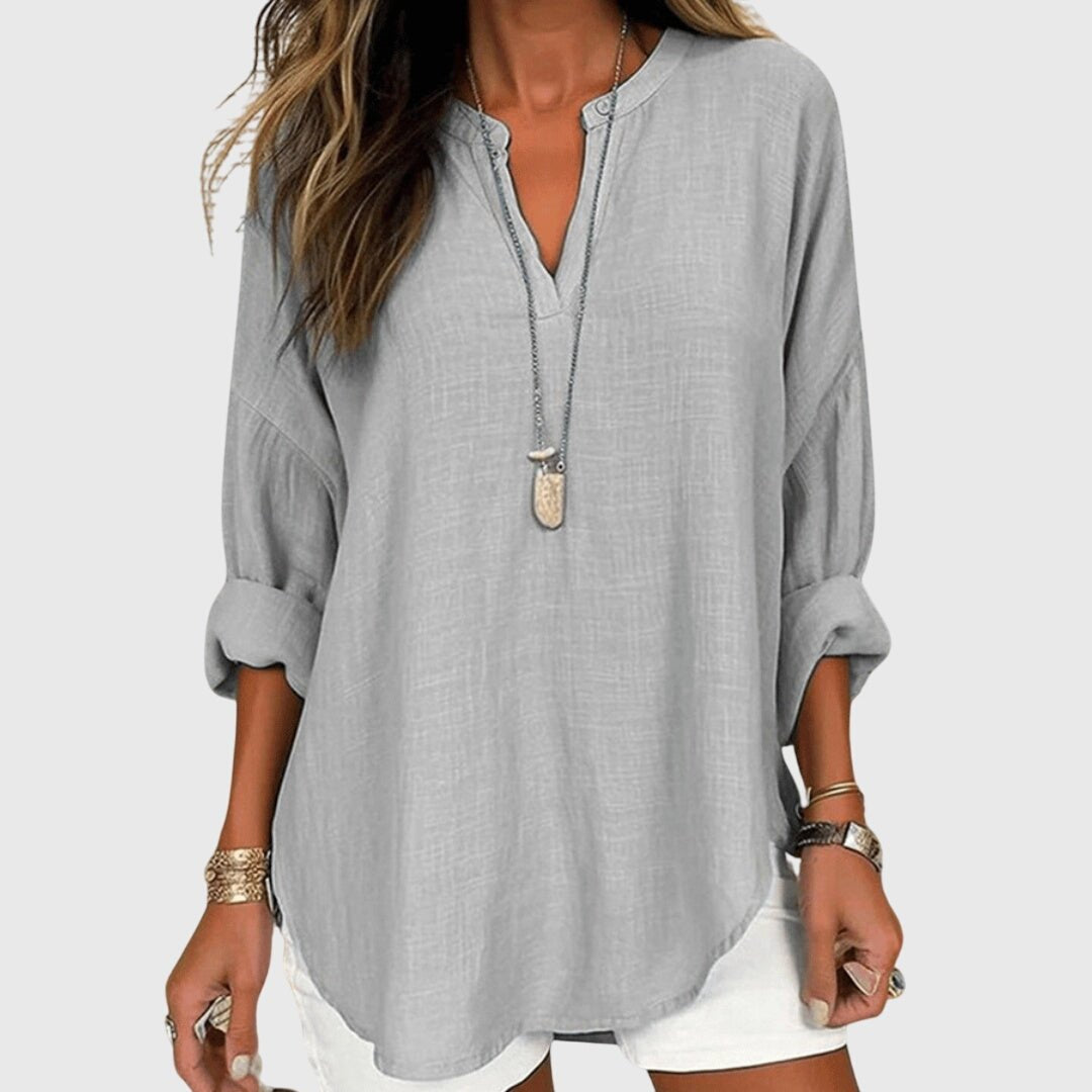 Graceful V-neck tunic shirt for women, with comfortable relaxed long sleeves. Everyday style.