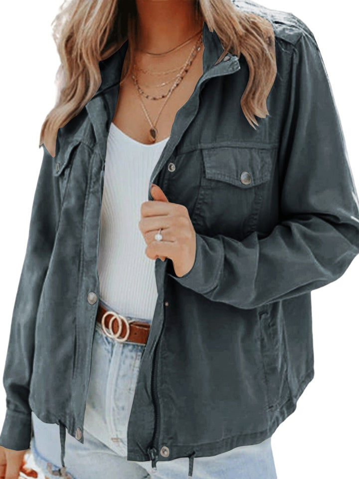 Modern elegant women's jacket, featuring long sleeves and a sophisticated design, great for any occasion.
