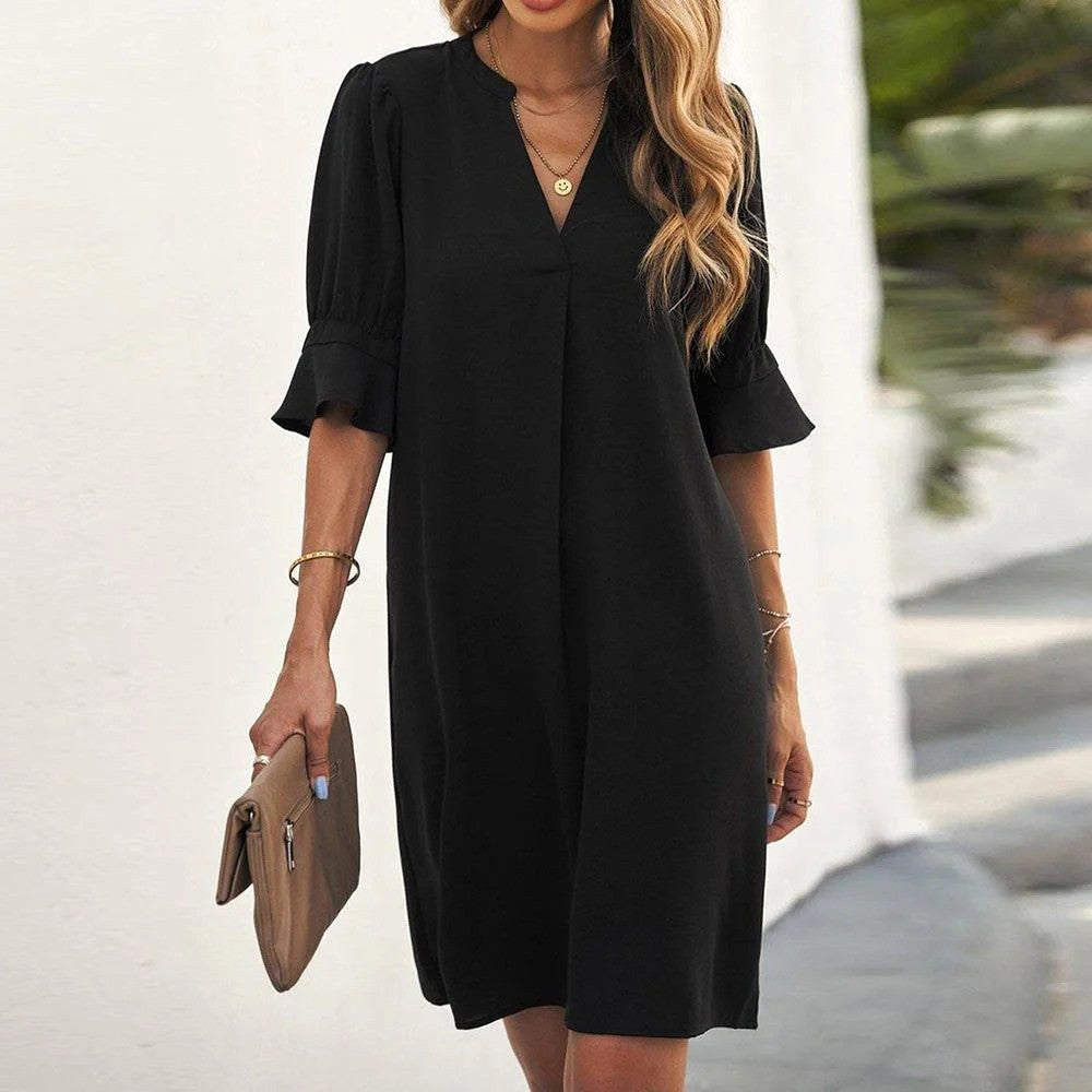 Elegant black midi dress for women, versatile classic style perfect for parties or everyday wear.