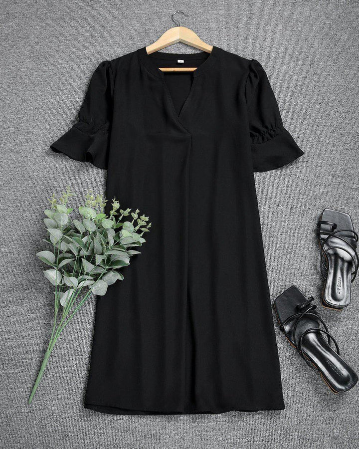 Versatile women's black midi dress, perfect for a party dress or elegant everyday wear.