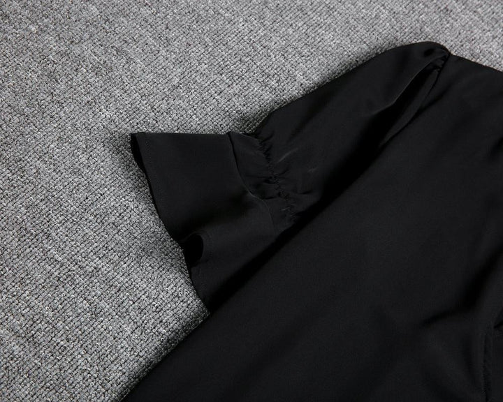 Stylish women's black midi dress, a versatile and elegant piece for any wardrobe, suitable for parties.