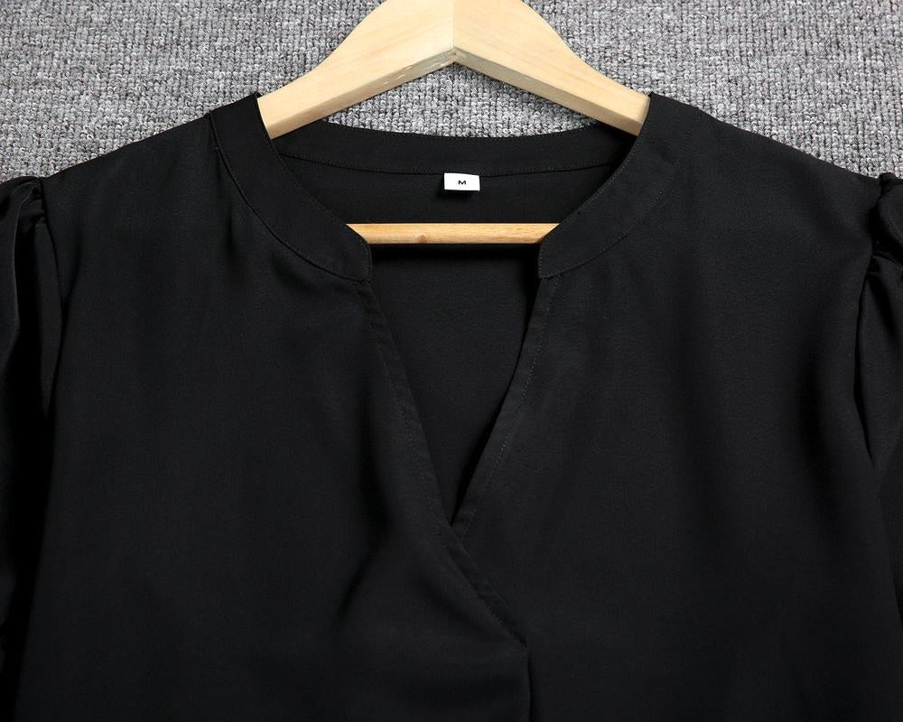 Classic elegant black midi dress, a comfortable and timeless wardrobe staple for women's fashion.