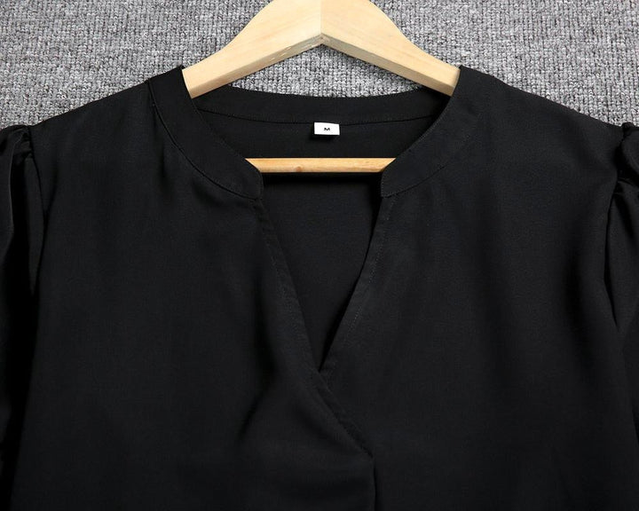 Classic elegant black midi dress, a comfortable and timeless wardrobe staple for women's fashion.