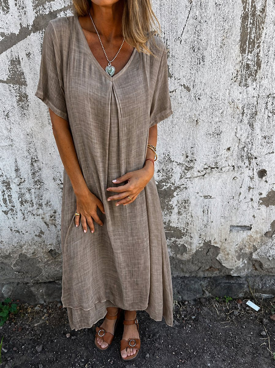Women's relaxed fit V-neck flowy maxi dress in soft fabric, perfect for cozy casual summer everyday wear.