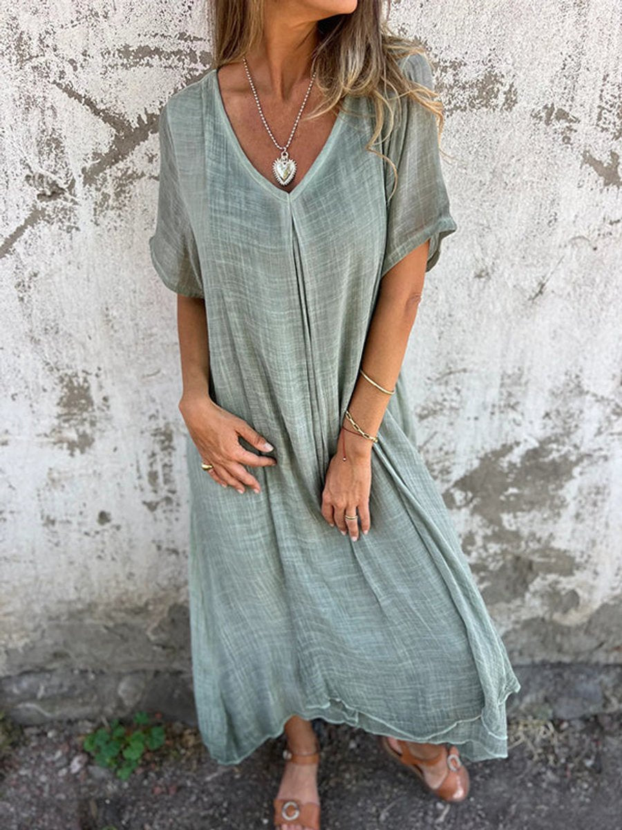 Cozy women's V-neck maxi dress with a relaxed flowy silhouette, great for comfortable summer casual fashion.