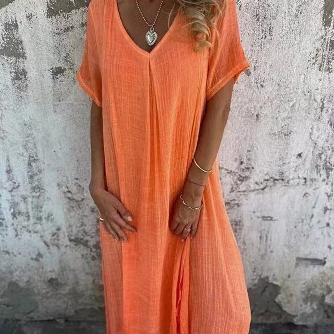 Relaxed fit women's short sleeve V-neck maxi dress, a comfortable and flowy option for warm weather casual style.
