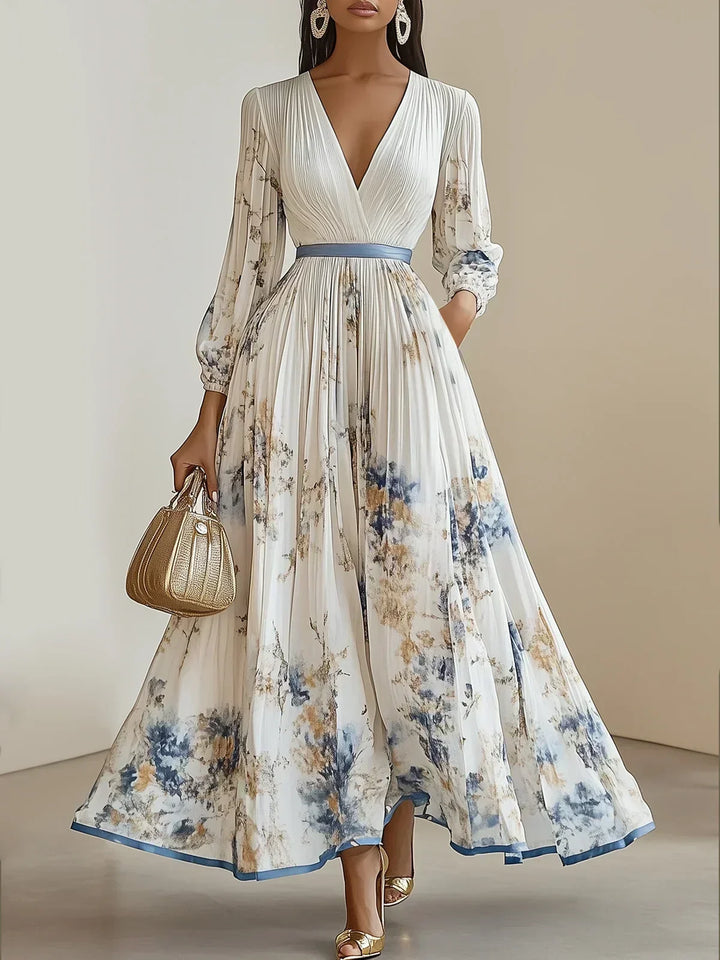 Elegant women's white floral V-neck maxi dress with puff sleeves, perfect for garden parties & race day.