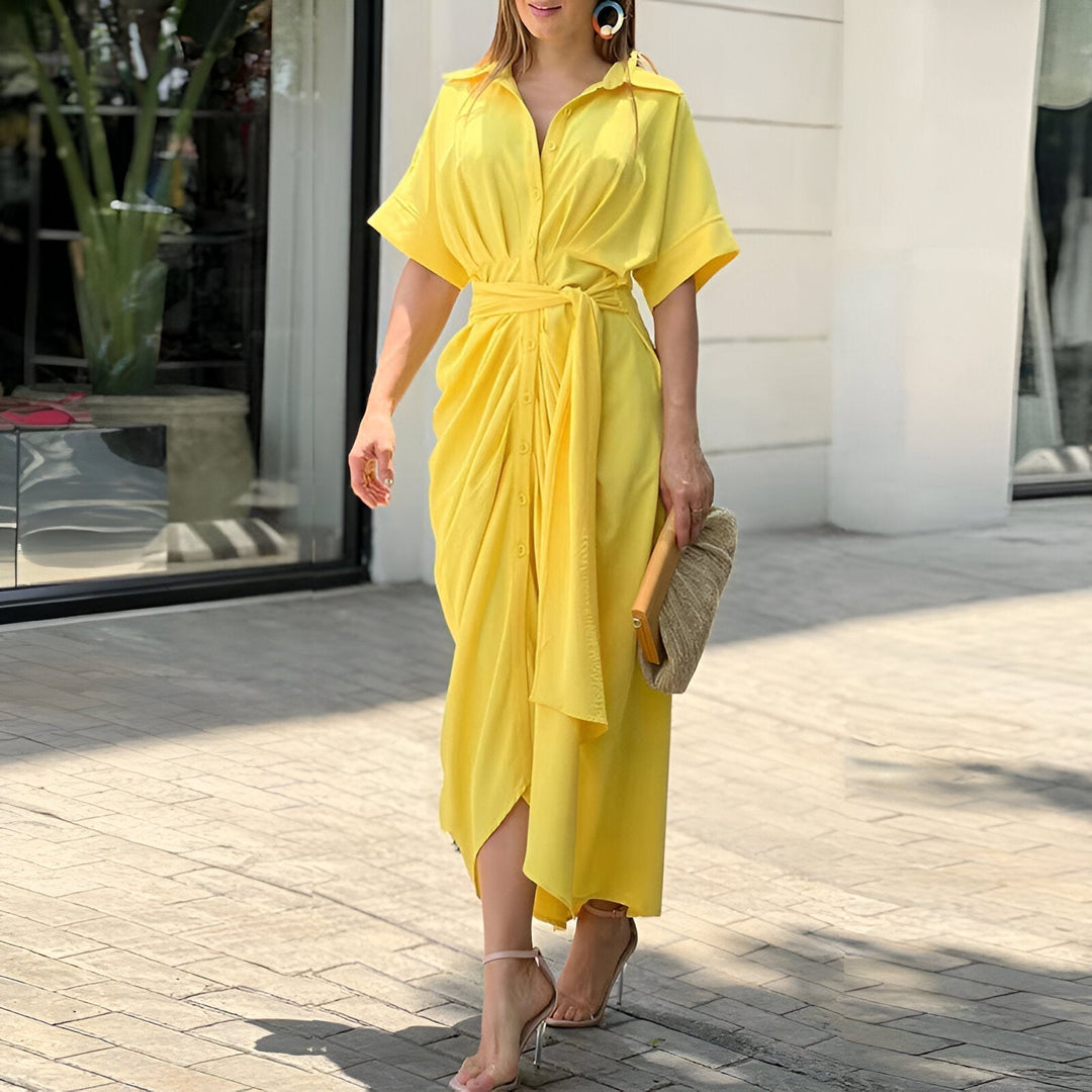 Women's summer midi dress with a unique abstract print, stylish collar, and a flattering belted waist.