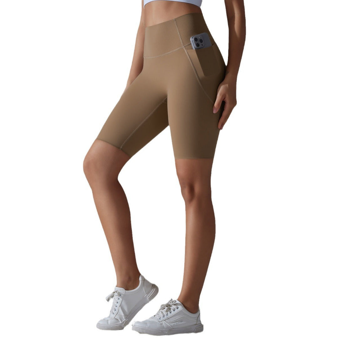 Comfortable high-waisted women's yoga shorts with pockets, great for active lifestyles.