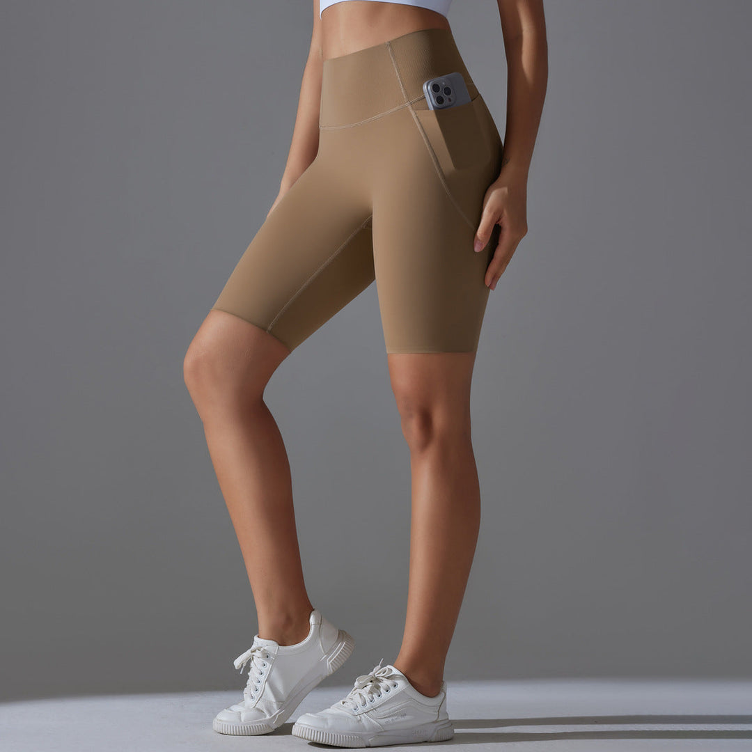 Versatile women's high-waisted active shorts with pockets, suitable for all workouts.
