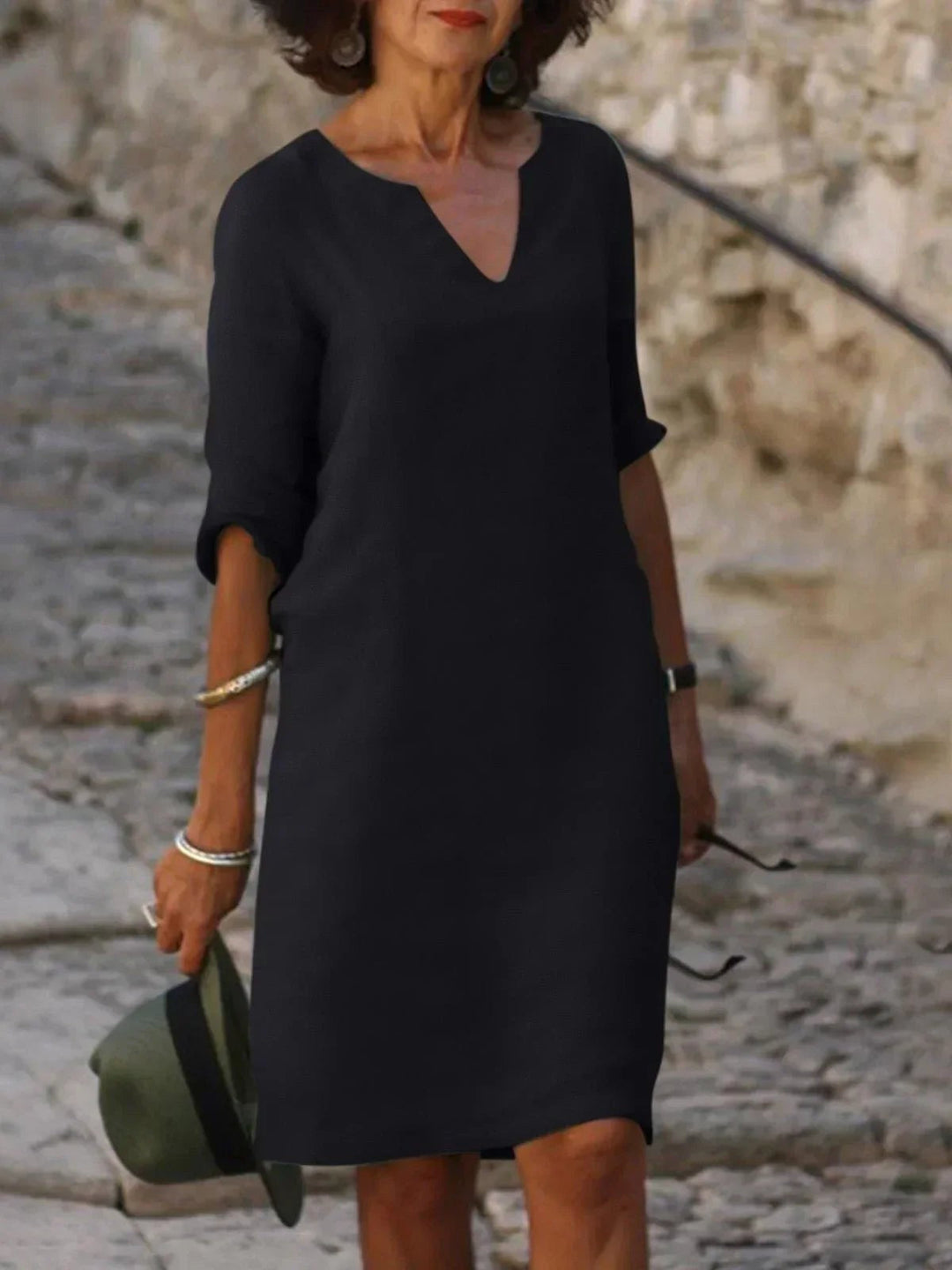 Elegant women's V-neck midi dress for summer occasions, perfect for parties & events.