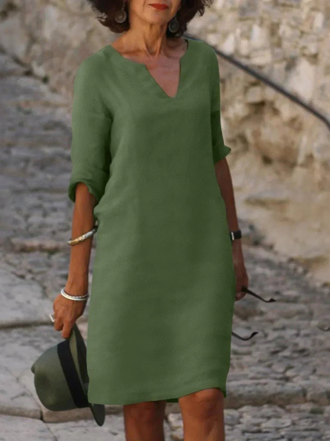 Versatile women's V-neck midi dress, an elegant choice for summer parties and events.