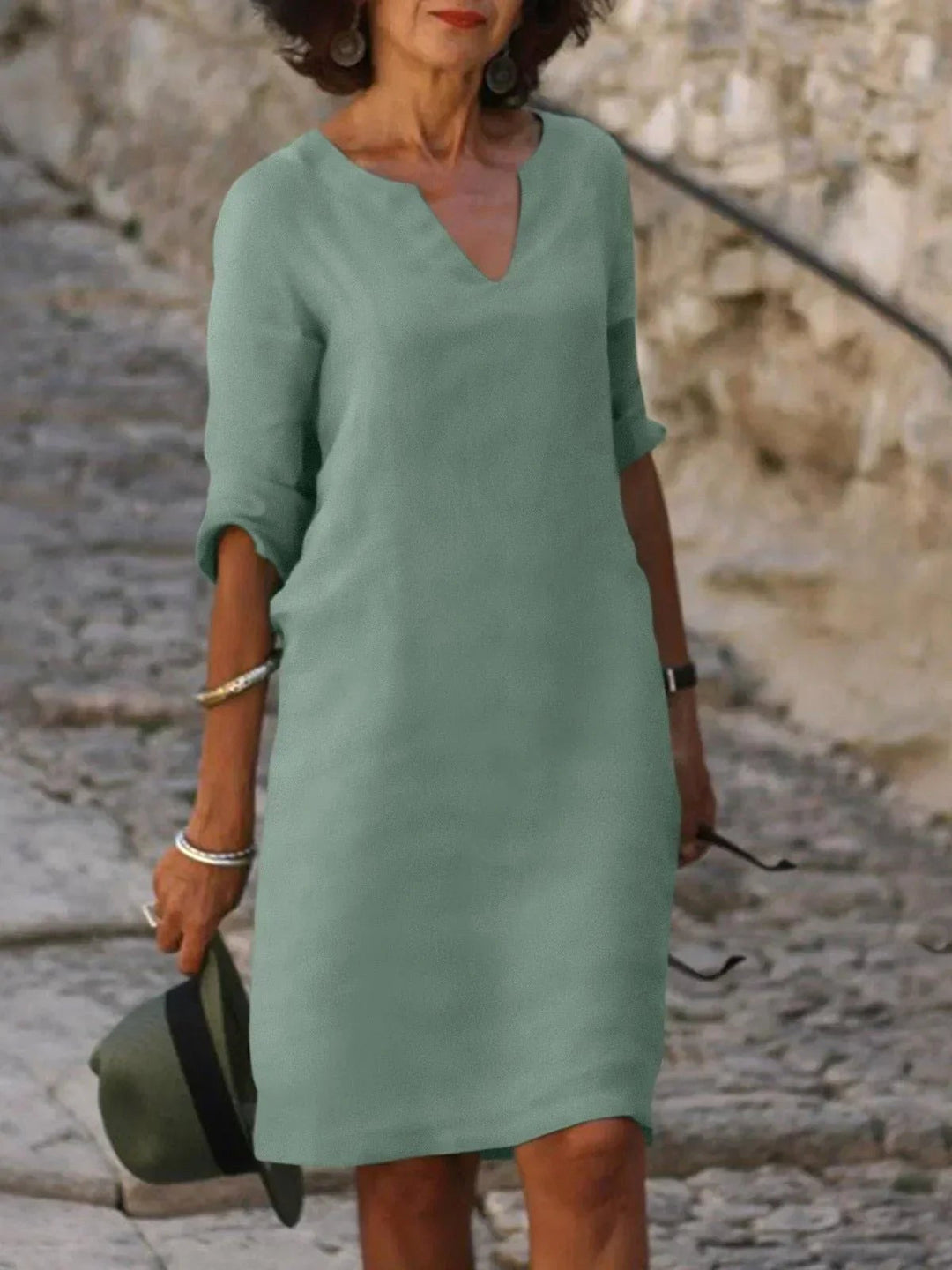 Beautiful women's summer V-neck midi dress with a flattering fit for any occasion.