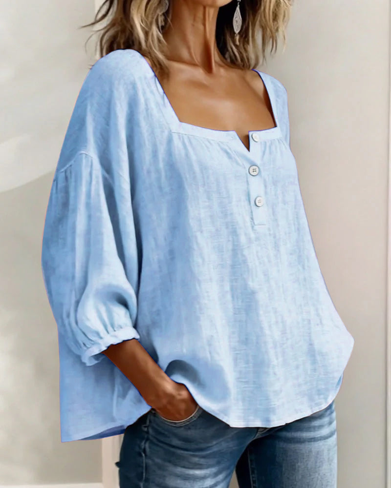 Modern women's linen shirt, square neck, trendy balloon sleeves. Relaxed fit for spring/summer casual style.