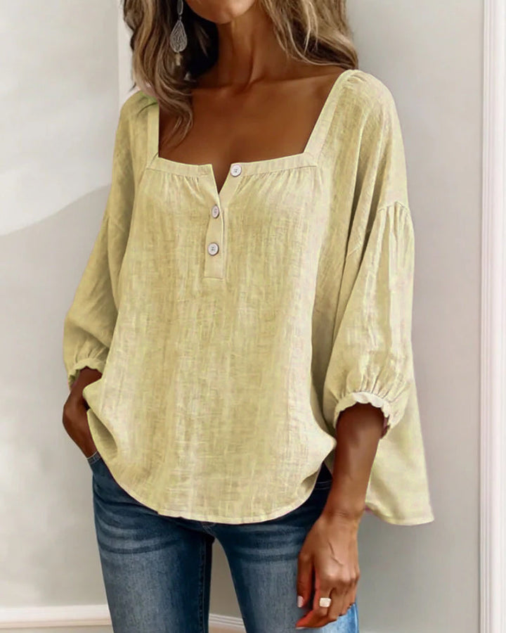 Comfortable women's linen shirt, square neck, chic balloon sleeves. Versatile for casual to elegant summer looks.